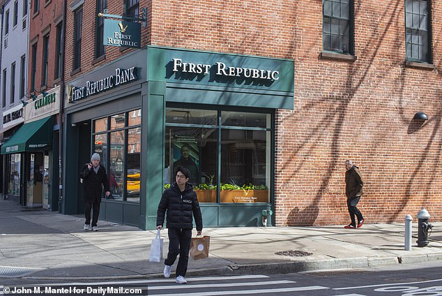 A First Republic branch in Manhattan is seen on Wednesday, after Standard & Poor's downgraded the bank's bond rating to junk