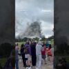 Spectators watch controlled building implosion in Louisiana