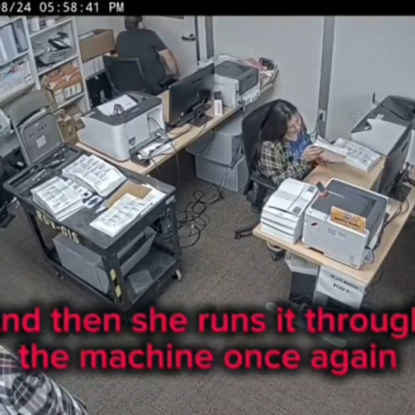 Footage has been obtained of an election worker in Orange County, California, counting the same large stack of ballots three times on the evening of November 8th