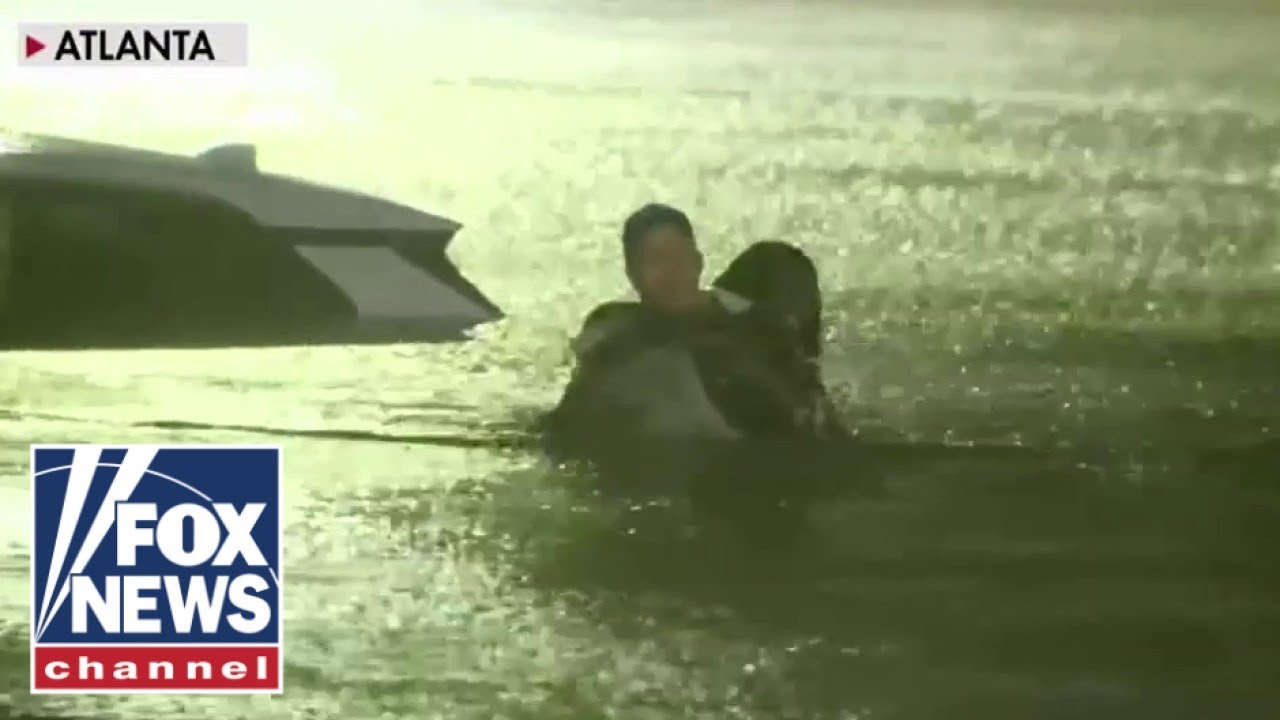 FOX Weather reporter rescues woman from car as floodwaters rise