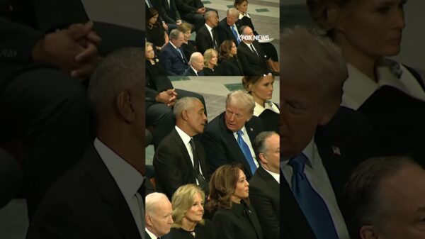 Trump and Obama are seen talking before Jimmy Carter’s funeral